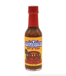 A bottle of Suckle Busters Hot Sauce